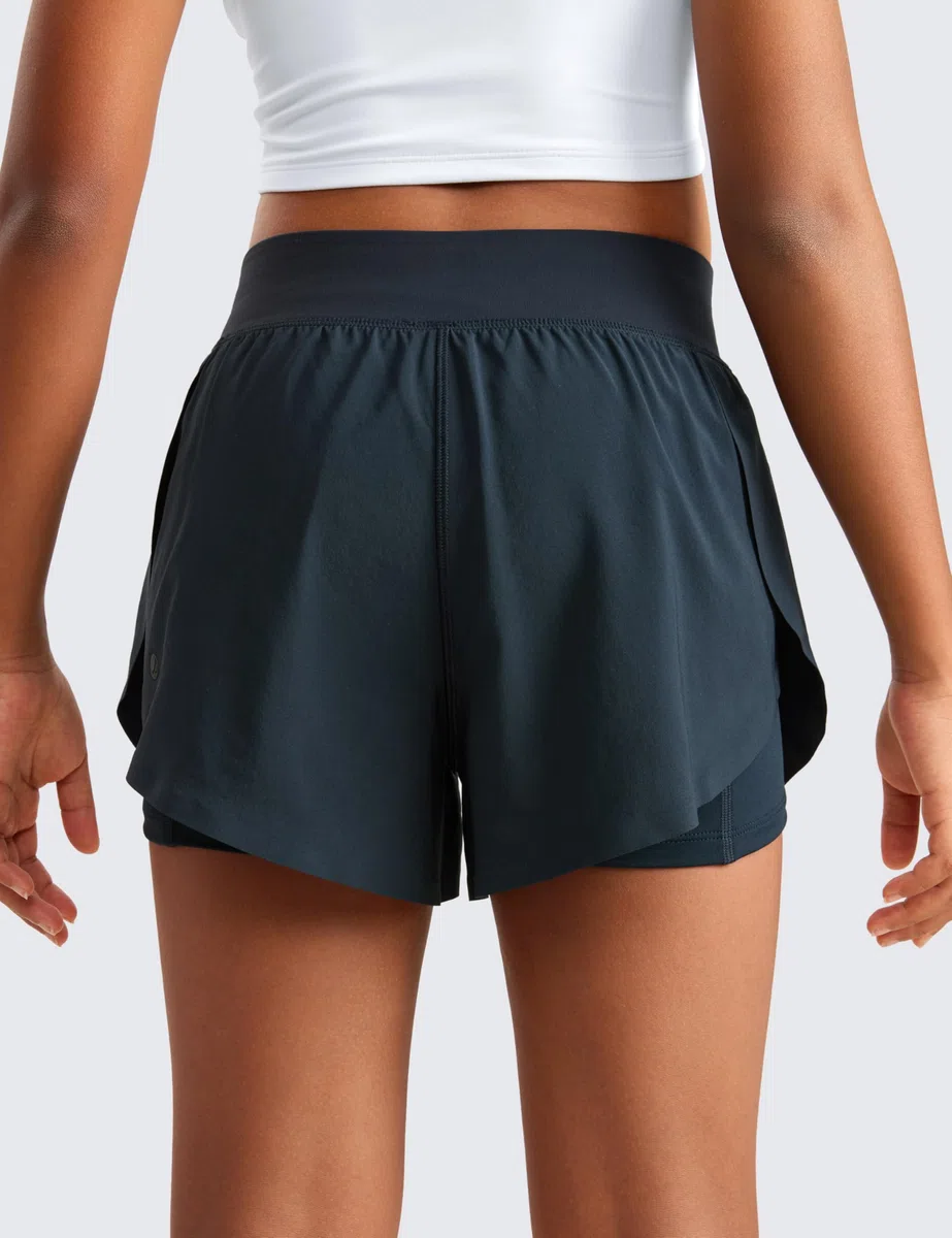 CRZ YOGA Ragazze 2 in 1 Delfino Atletico Correre Pantaloncini con Tasche Allenamento Casuale Tennis Calcio