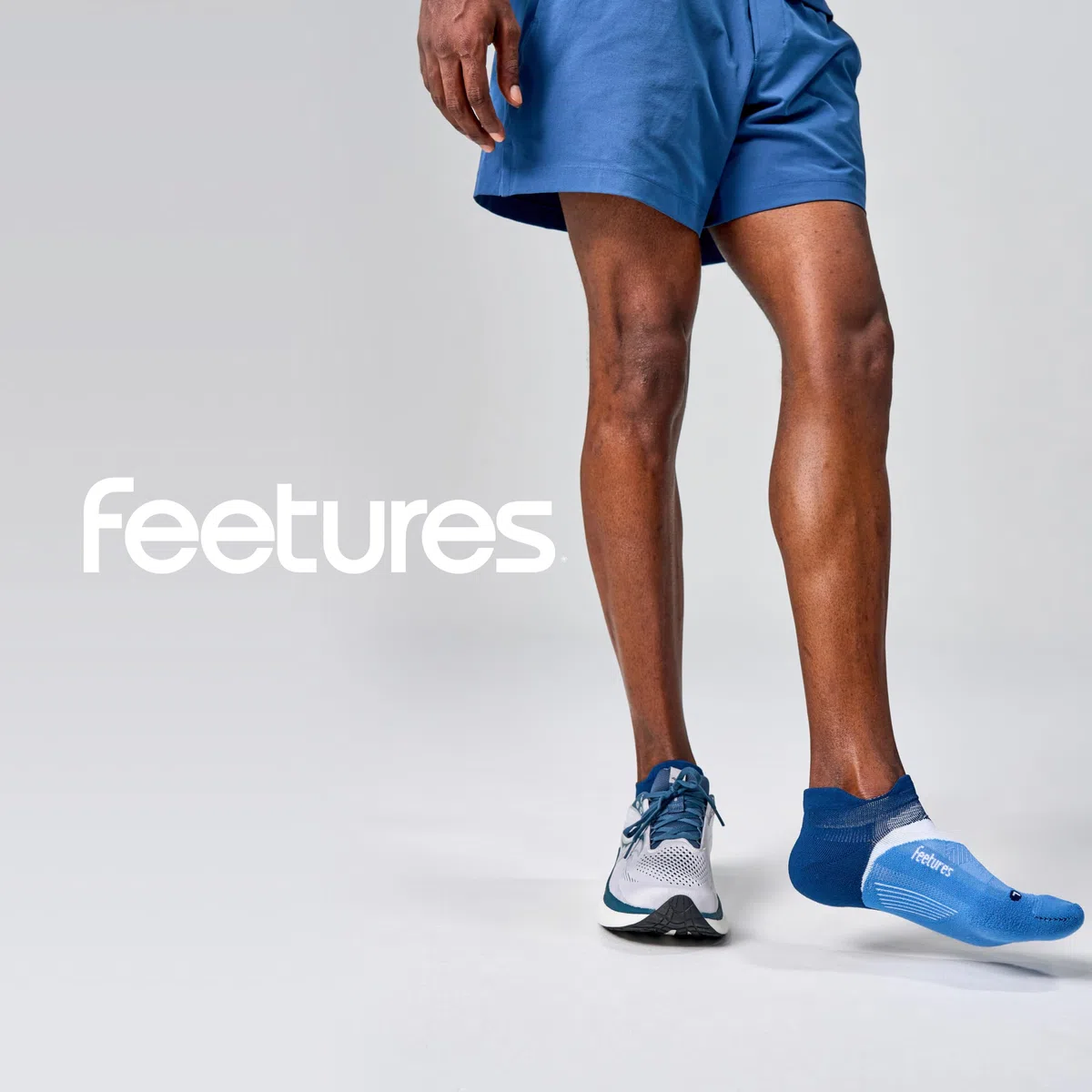 Feetures Elite Light Cushion Quarter Solid - Calzino Sportivo con Compressione mirata - (1 Paio)
